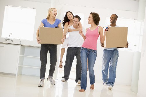 Rental company representative assisting with moving van booking